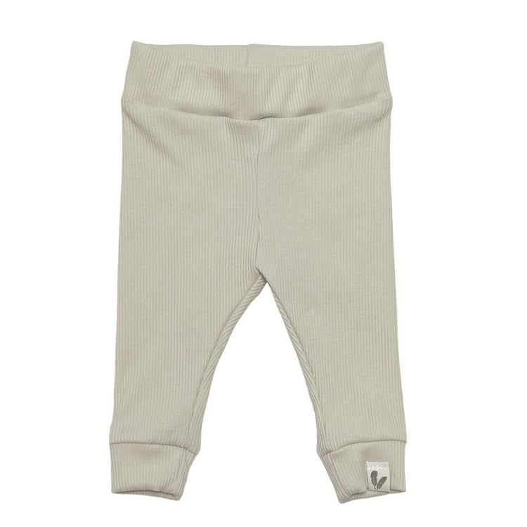 Newborn baby wearing natural beige rib jersey broekje for comfort and style