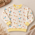 Kindersweater Teckelprint Crème — Schattige Hondenprint, Ronde Hals (maat 86–134)
