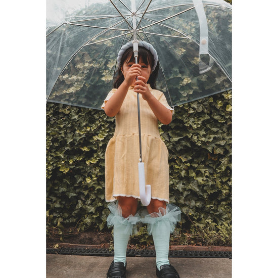 Sol Dress – Zacht Gebreide Jurk met Peter Pan-kraag