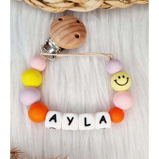 Speenkoord met naam Smiley babypink