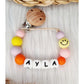 Speenkoord met naam Smiley babypink