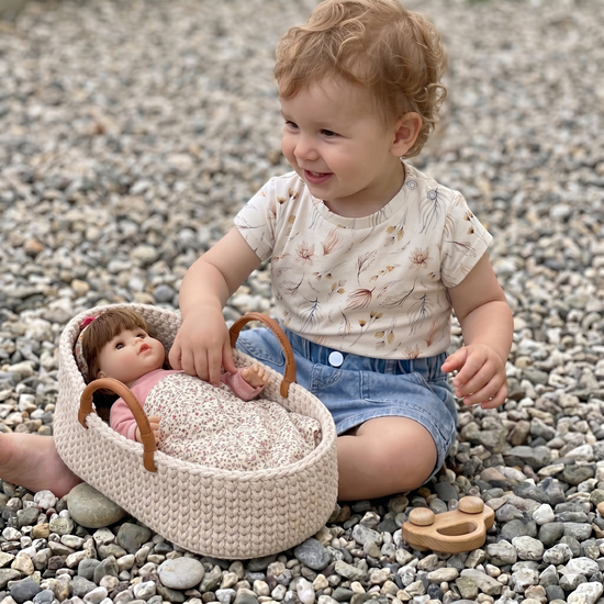 Gebreide poppenreiswieg 35cm